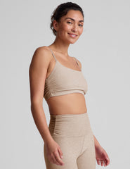 brown bra with shirred detailing on the sides and adjustable straps.