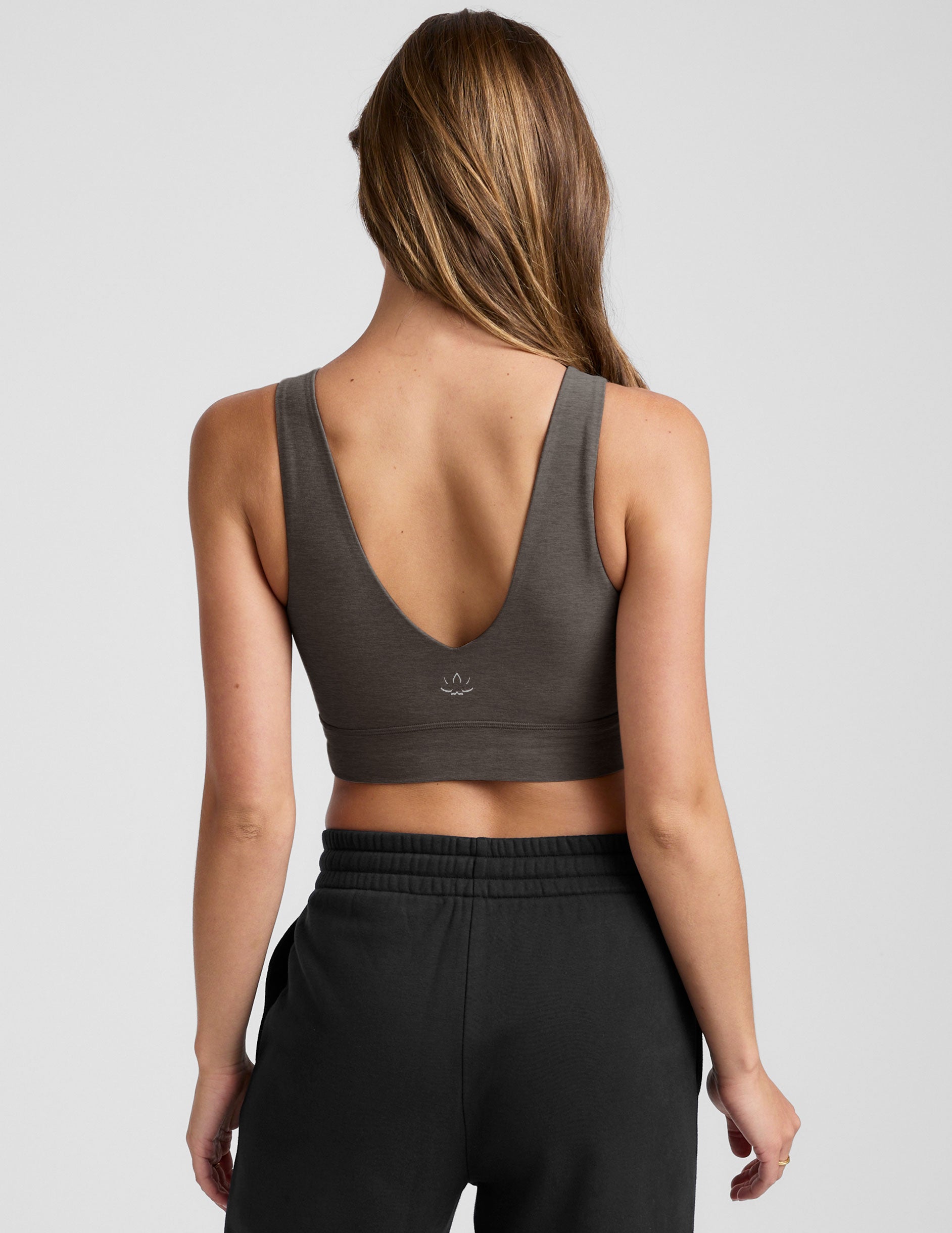 gray long line style bra with a front and back v-neck.