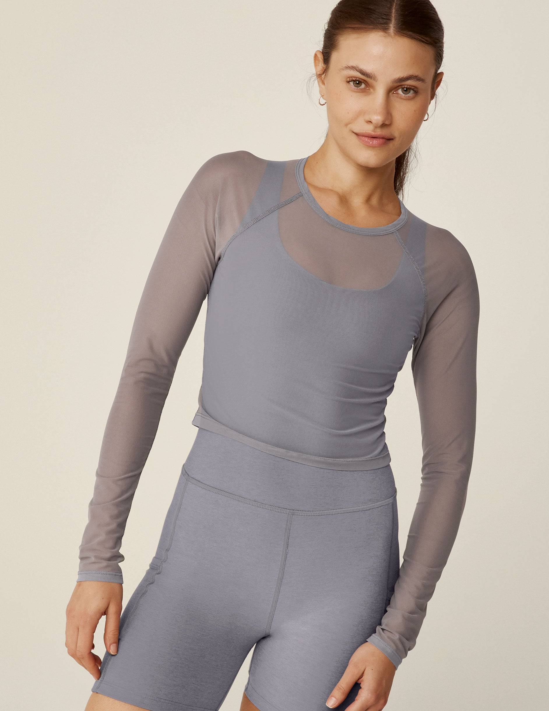 gray long sleeve mesh cropped top.