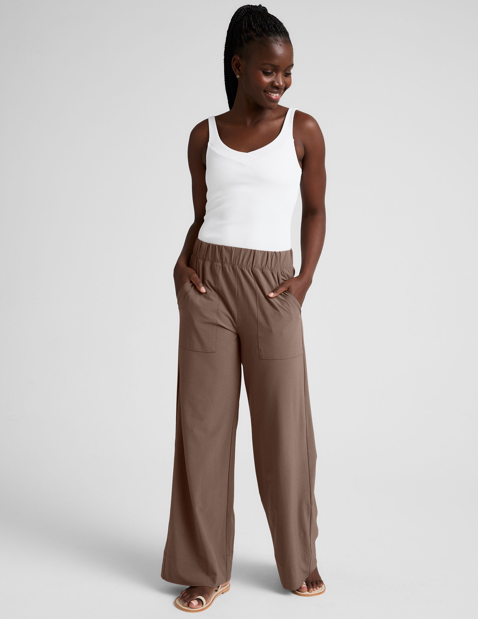 white ribbed tank top with a soft front and back v neckline.