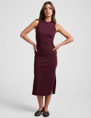 red midi length ribbed dress with side slits and a mock neckline.